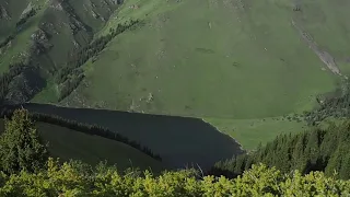 Bikepacking hidden lake in Chon-Kemin mountains in Kyrgyzstan. Teaser.