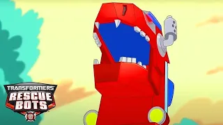 Here's Optimus Prime's Dino Mode! | Transformers: Rescue Bots | Kids Cartoon | Transformers TV