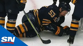 Jeff Skinner Helped Off Ice After Carl Hagelin's Stick Twists His Leg