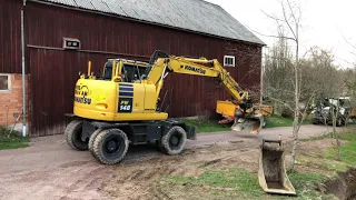 Köp Grävmaskin Komatsu PW 148-10 med vagn & GPS-redskap på Klaravik