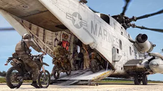 Skilled US Marine Biker Rides Into Gigantic CH-53 Cargo Bay In the Desert