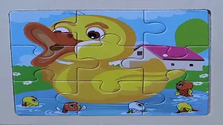 Bebek lucu, anak bebek - Menyusun puzzle "Bebek kuning"