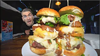 "MOST PEOPLE PUKE" Famous Chili Cheese Burger Challenge | Joel Hansen