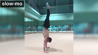 MAG 2022 COP Artistic gymnastics elements [A] turn in handstand (slow-mo)