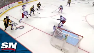 Danton Heinen Squeezes The Puck Past Alexandar Georgiev For A Go-Ahead Goal