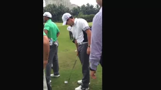 Rory McIlroy doing tricks before his match against Tiger Woods at Mission Hills