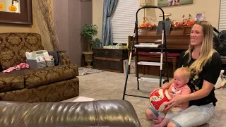 Cute baby laughing with big brother