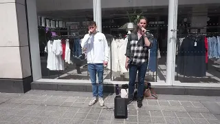 Stian and Sam sing Bring It Home from Les Miserables in Lord Street Liverpool