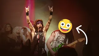 Fan plays with STEEL PANTHER onstage