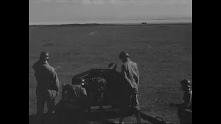 French troops shoot an Italian Autoblindo 41 armored car with a German Pak 40 anti-tank gun