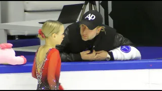 Evgeni Plushenko prepares Elena Kostyleva to go on the ice. Free program and grades