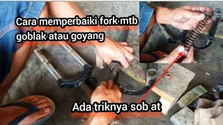 How to fix rocking mtb fork