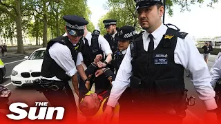 5G coronavirus conspiracy theorists stage anti-lockdown protest outside London police HQ