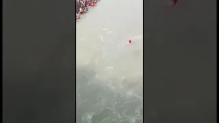 Senior Citizen Woman Diving in Ganga River Haridwar