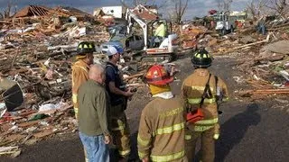 Dozens of tornadoes tear through Midwest