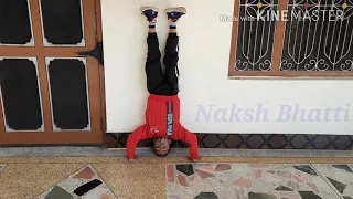 Headstand with help of wall