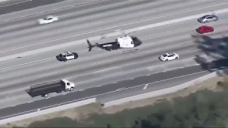 Police chase armed robbery suspect through LA streets, freeways