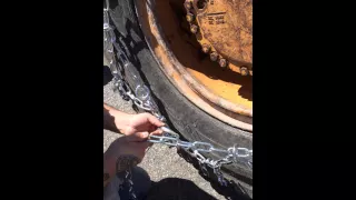 ©TireChain.com TND Loader Grader  Diamond Tire Chains Installation