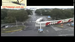 Train crashes with truck at a level crossing caught on CCTV