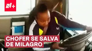 Chofer de tráiler se salva de caer de un puente tras accidente - N+