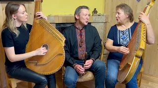 Mother, Father and Daughter Singing Ukrainian Song