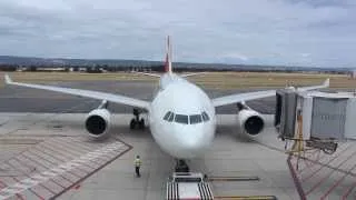 Qantas Airbus A330-200 push back from the terminal at Adelaide Airport