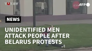 Unidentified men attack people in Belarus after protests | AFP