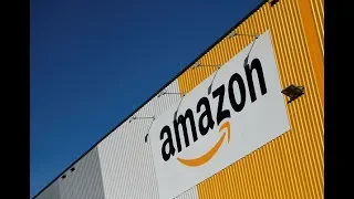 Amazon shares dip after posting record-breaking sales