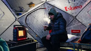 Winter Camping on the Ice in a fishing hut in freezing conditions