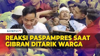 Reaksi Paspampres Lihat Gibran Ditarik Warga saat Bagi-Bagi Susu di Muara Baru