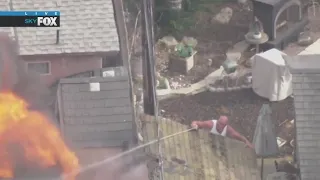 Men fight Redondo Beach house fire with garden hose and squirt gun
