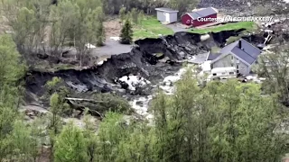 Landslide carries buildings into sea off Norway