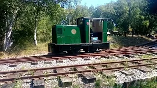 Ruston narrow gauge locomotive shunting wagons at Norden, in the Purbeck Mining Museum