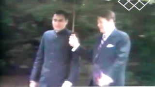 Power of India American president holding umbrella of rajiv Gandhi