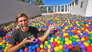 Hide and seek in 200,000 ball pit! (on our rooftop)