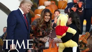 Trump & Melania Putting Candy On Head Of Trick-or-Treater Dressed As Minion Is A Flash Point | TIME