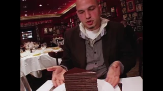 Strip House is world famous for their 24 Layer Chocolate Cake!  Watch and be