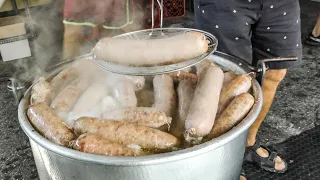 Italy Street Food. Huge Blocks of Meat, Giant Sausages Cooked and Cut