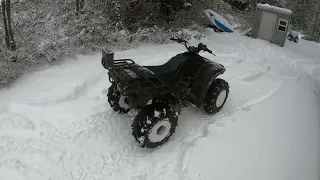 Trying to get the quad stuck in the snow