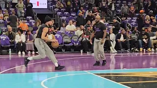 DEVIN BOOKER (listed out) SHOOTING SOME SHOTS BEFORE TONIGHTS GAME VS LAKERS AT FOOTPRINT CENTER