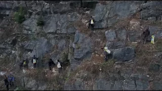 Farmers Plant Trees on Cliffs in China's Chongqing