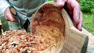 Woodcarving a bowl with handcrafted tools