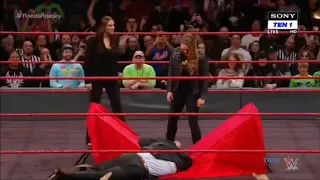 Ronda attacks Triple H then Stephanie slaps Ronda Rousey