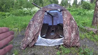 Печка и две раскладушки в палатке Спутник-3