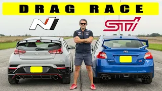 Hyundai Veloster N DCT takes on Outgoing Subaru WRX Sti, can it win? Drag and roll.