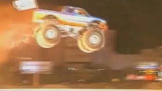 Monster truck Bigfoot jumps 7 cars and a tractor trailer