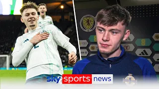 Conor Bradley and Michael O'Neill react to Northern Ireland's win over Scotland