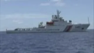 Chinese coast guard ships confront Philippine boats