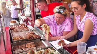 Street Food in Gdansk, Poland. Sausages, Grilled Meat, Pork Steaks, Wrap, Langos, Kurtos, Pizza