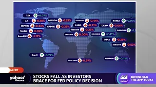 Stocks fall as investors await Fed rate hike decision